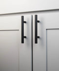 10 Pack Matte Black Cabinet Handles And Drawer Pulls For Doors And Dresser Drawers installed on white cabinet doors