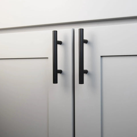 10 Pack Matte Black Cabinet Handles And Drawer Pulls For Doors And Dresser Drawers installed on white cabinet doors