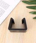 4 Pack Plastic Sofa Clips for Rattan Furniture Easy Install Sturdy Snug Fit Chair Fasteners on wooden surface