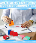 Fresh Out The Box 8 Piece Pre Inked Office Stamp Set With Bold Multicolor Plastic Handles in use on documents.