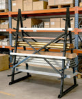 Built Tough As Nails Adjustable Seven Tier Steel Lumber Rack with wood and metal stacked in a garage setting.
