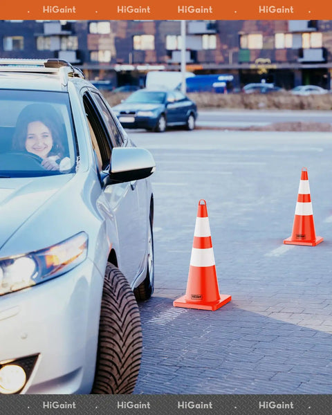 Car navigating around Six Pack 28 Inch Traffic Safety Cones With Reflective Collars For Road Safety Parking Lot And Driving Training