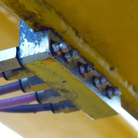 Close-up of connector with Five Pack Brass Straight Grease Fittings R3/8-19 SAE Thread Hydraulic Grease Nipples for cars maintenance.