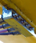 Close-up of installed 15 Piece Brass Straight Grease Fitting Kit with M5x0.8mm Metric Thread on machinery, showing durability.