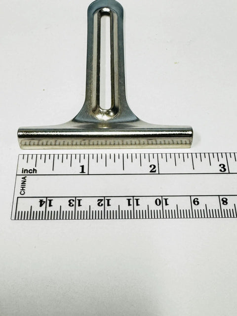 2.5 Inch Wide Seam Guide With Dual Thumb Screws For Precision Stitching On Sewing Machines next to a ruler for size comparison