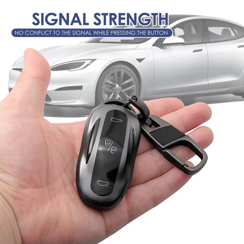 Tesla Key Fob Cover With Keychain Grippy TPU Case For Model 3 Model Y Model S held in hand, features shockproof protection.
