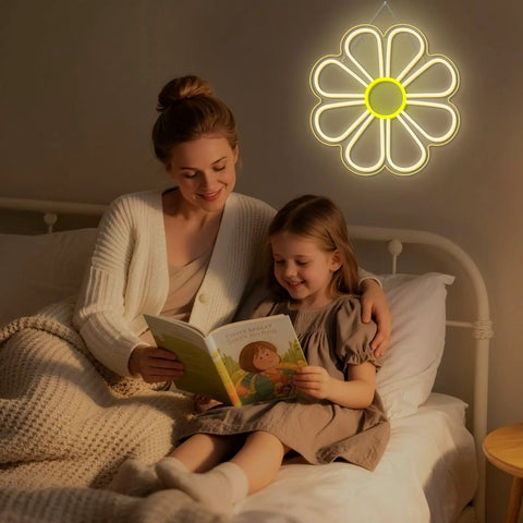 Mother and daughter reading under Flower Neon Sign Daisy Window Light LED Warm White For Bedroom Decor on wall.
