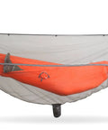Dragonfly Insect Net For Hammocks, 360 Degree Mosquito Shield showing protection around orange hammock.
