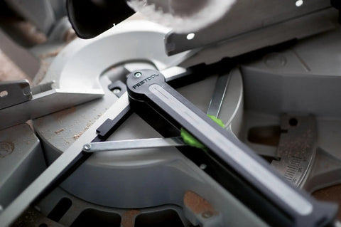 Close-up of KAPEX KS 120 REB Sliding Compound Miter Saw With Rail Forward Design showing precise angle measurements.