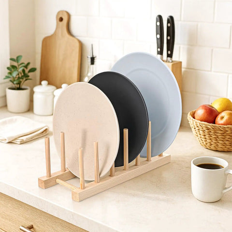 Eight Pack Bamboo Wooden Plate Rack Six Slots Kitchen Dish Drying Organizer For Pots Lids Cutting Boards Cups in use with plates arranged.