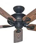 Mariner 52 Inch Bronze Indoor Outdoor Ceiling Fan with Reversible Medium Oak Blades Whisper Wind Motor shown from below
