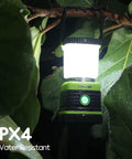 Rechargeable LED Camping Lanterns Beast Bright 1000 Lumens With Four Modes 4400mAh Power Bank hanging in a tree, IPX4 waterproof.