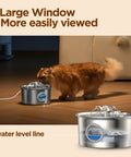 Stainless Steel Cat Water Fountain Two Point Six Liter Ultra Quiet Pet Fountain With Flower Spout and LED Blue Light next to a cat indoors.
