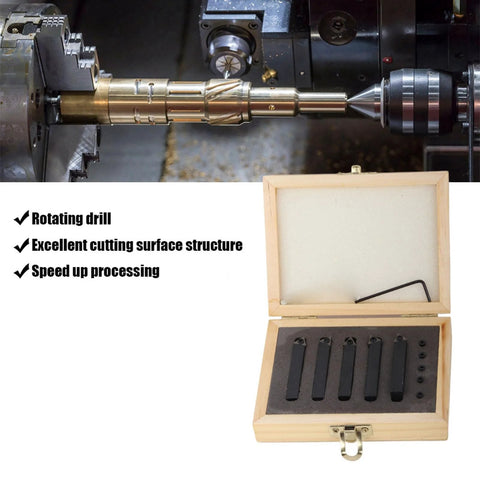 Carbide turning tool set with five rectangular inserts in a wooden case, shown beside a metal lathe with a mounted cutting tool.