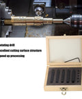 Five-piece carbide turning tool indexable set with 5/16-inch cutters in a hardwood storage box