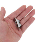 4 Pack Mini Rubber Caster Wheels Featuring Double Row Dual Structure Carbon Steel Rigid Casters in hand for size comparison.
