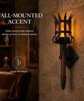 Medieval LED Torch Wall Sconce, Gothic Castle Flame-Effect Lamp mounted on stone wall with flame glow and brown shaft.