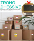 Massive 600 Count Moving Box Labels Pack For Three To Four Bedroom Homes with color-coded labels on stacked boxes
