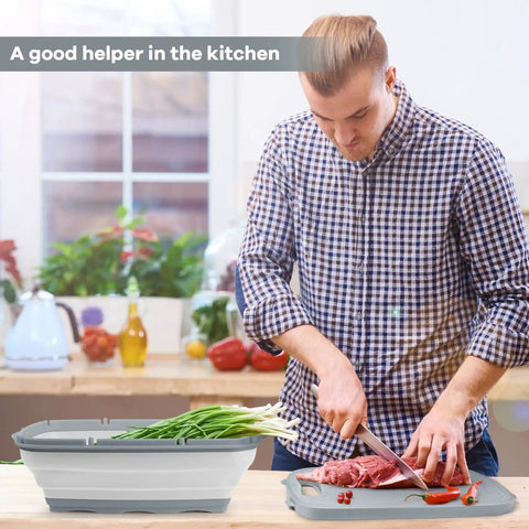 Man using 9 In 1 Collapsible Cutting Board With Colander For Camping And Outdoor Kitchens in a kitchen setting