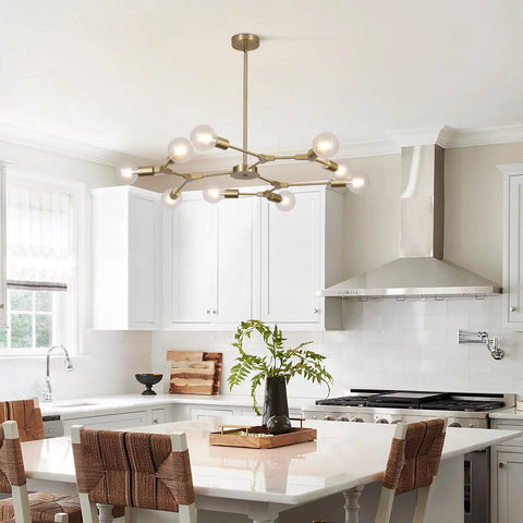 Lit Brushed Brass Sputnik Chandelier With Adjustable Hanging Arms Industrial Flush Mount Ceiling Light Fixture in modern kitchen.