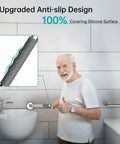 Elderly man using 16 Inch Shower Grab Bars For Bathroom Safety With Anti Slip Handles For Elderly Seniors Handicap And Pregnant Women, Rustproof Stainless Steel, Gray 2 Pack, Non Slip Grips For Wet Bathrooms next to a sink, featuring upgraded anti-slip design.