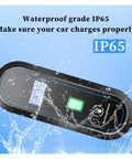 Plug And Go Portable EV Charger 7KW 32 Amp Fast Juice Up 240 Volt Heavy Duty Cable showing waterproof IP65 rating with splash.