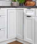 Corner kitchen cabinet with Two-Tier Pie-Cut Lazy Susan for Corner Base Cabinets 28-Inch Plastic Swivel Organizer behind the doors