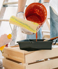 Heavy Duty Cotton Thread Paint Roller With Zero Hassle Grip And Smooth Roll Action Built To Make Rough Surfaces Look Completely Fresh For Any Weekend Warrior Project, loaded with paint.