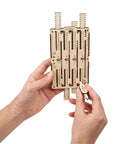 STEM Arithmetic 2 In 1 Wood Mechanical Puzzle Kit For Adults DIY Science Model Set With Augmented Reality App Learn Mechanical Adder And Multiplier Educational Engineering 3D Puzzles, wooden addiator held by hands