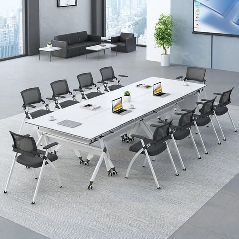 Lightweight Folding Mobile Computer Desk With Locking Wheels Steel Flip Frame Laptop Station with sliding casters in modern office setup.