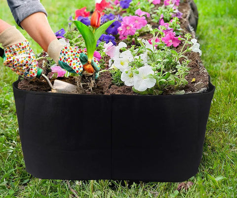 Fabric Raised Garden Bed 2Ft By 4Ft No Fuss Durable Planting Bed filled with flowers and soil, breathable felt material