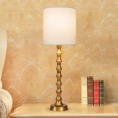 Gold Buffet Lamps Set Of 2 Tall Skinny Candlestick Style Lamps For Living Room And Dining Room on an ornate side table
