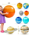 Girl with Nine Giant Inflatable Solar System Planets With Pump For Ceiling Decor Epic Space Classroom Display And Boys Room Astronomy Theme Party Supplies Educational Gift For Ages 6 To 12.