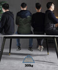 Rock Solid Heavy Duty Metal Desk Legs Adjustable Rectangular Steel Table Base supporting 300kg with four seated individuals.