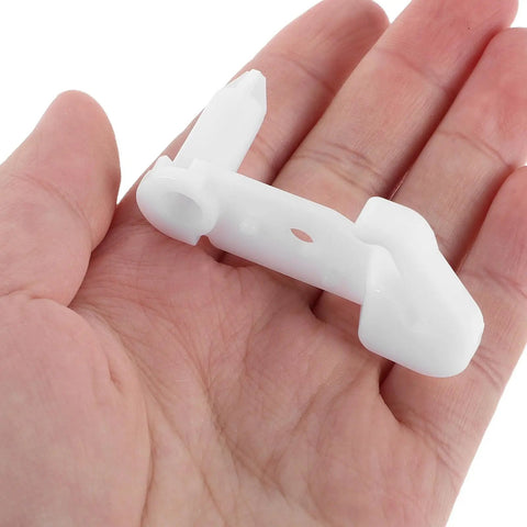 Heavy Duty Plastic Freezer Door Stop For Fridge Repair held in hand, white plastic hinge catch holder for easy DIY installation.
