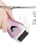 Cordless Rechargeable Electric Foot File And Callus Remover For Stubborn Dead Skin Care in water, showcasing IPX6 waterproof design.