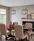 Dining room with Oak Wood Farmhouse Lantern Pendant Light With Silver Metal Finish, cozy rustic vibe, open geometric frames