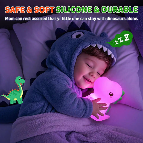 Child sleeping with Totally Adorable Dino Night Light For Kids 3 To 8 Sixteen Color Silicone Dimmable Battery Operated toy