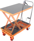 Heavy Duty Hydraulic Lift Table Cart With 500 Pound Capacity And 28.5 Inch Max Rise showing raised scissor lift design and sturdy wheels.