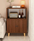 Wooden cabinet with 8 Piece Slick Matte Black Zinc Alloy Cabinet Ring Knobs With Screws, stylish storage solution in living room.
