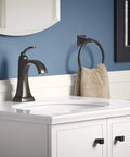 Ridgeport Single Control Lav Faucet In Oil Rubbed Bronze Finish For Bathroom Sink No Fuss One Handle Operation on white vanity