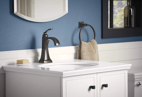 Ridgeport Single Control Lav Faucet In Oil Rubbed Bronze Finish For Bathroom Sink No Fuss One Handle Operation on white vanity