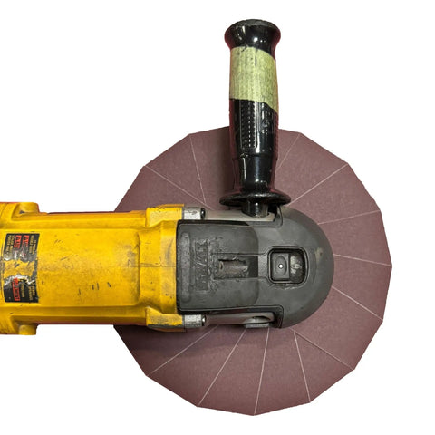 10 Inch Aluminum Oxide Sanding Pinwheel Beast Mode Durable For Drill 400 Grit Five Eighth Inch Arbor attached to yellow drill