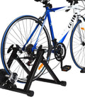 Indoor Bike Trainer Stand With Magnetic Flywheel For 26 To 28 Inch Road And Mountain Bikes setup with a blue and white bike