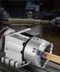 Heavy Duty Dividing Head With K11 3 Jaw Chuck And Mt2 Tailstock, featuring wooden workpiece, CNC milling precision.