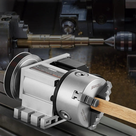 Heavy Duty Dividing Head With K11 3 Jaw Chuck And Mt2 Tailstock, featuring wooden workpiece, CNC milling precision.