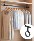 Closet with clothes on rod supported by Two Packs One And A Quarter Inch Heavy Duty Closet Rod Brackets In Stainless Steel Rustproof Flange Ends