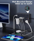 22 In 1 Ultra Flat Plug Power Strip With 16 Wide AC Outlets And 6 USB Ports Including 3 Type C Fast Charge A Handy Desk Or Home Office Power Hub That Can Run Up To 15 Devices At Once mounted on wall behind desk