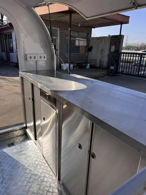 Road Ready Mobile Food Truck Trailer With Dope Commercial Kitchen Setup featuring stainless steel counter and locked storage.