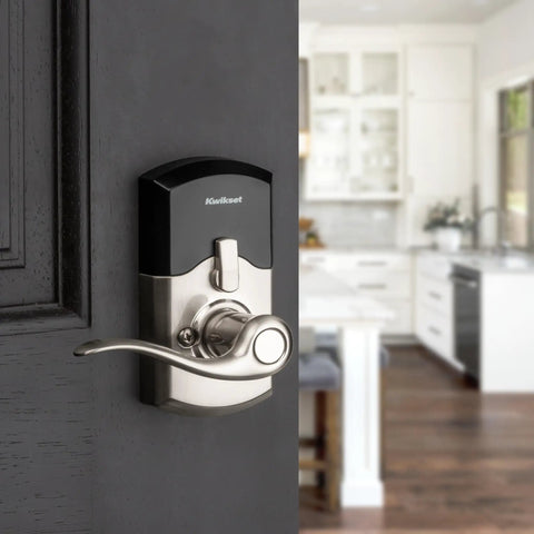 SmartCode 917 Keypad Keyless Entry Lever Deadbolt For Home in satin nickel on door with Tustin handle in modern kitchen